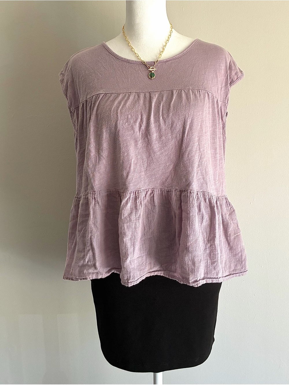 Anthropologie
Light purple babydoll blouse with ruffle hem